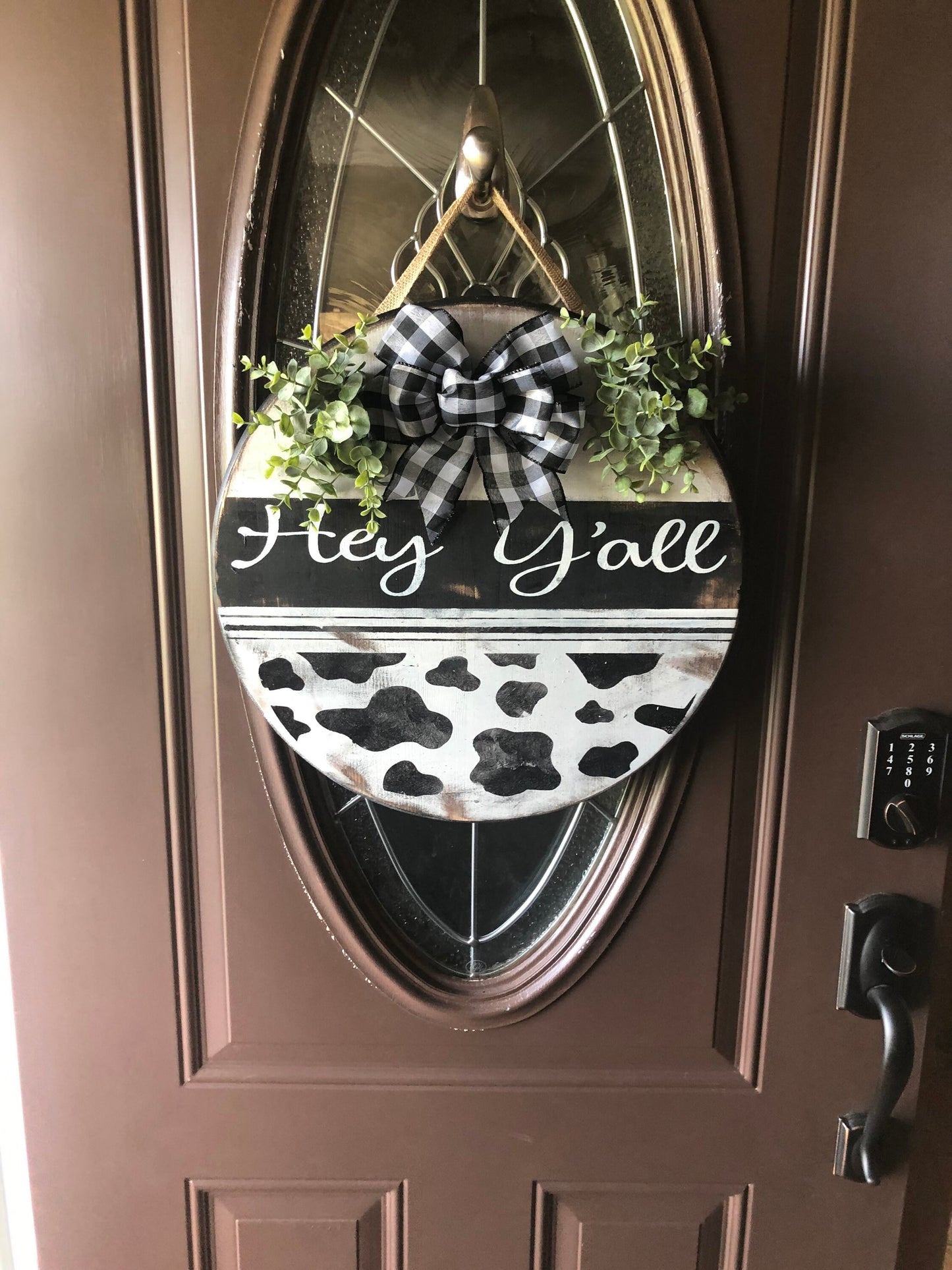 18” round door hanger/1” thick/front door sign/cow print door hanger/porch sign/welcome  sign/farmhouse sign/hey y’all